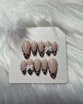Blue and gold floral press-on nails with 3D floral charms and pearl accents